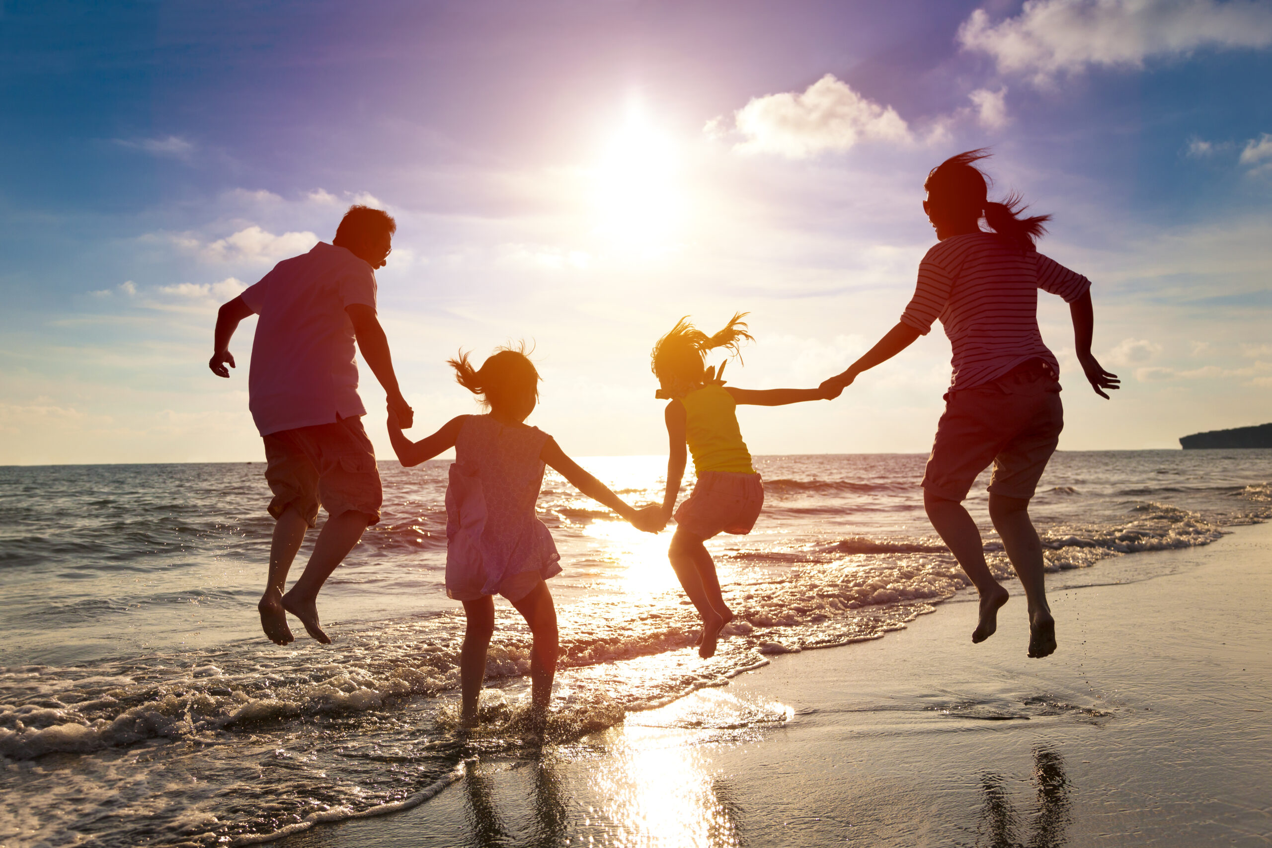 Family on summer vacation at the beach